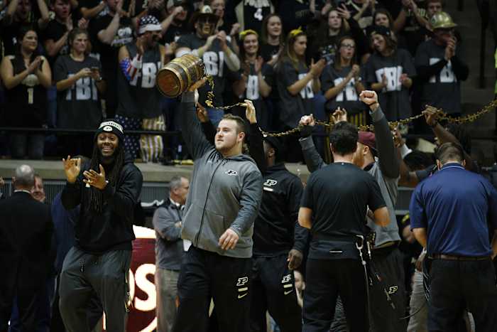 Kirk Barron shows off the Old Oaken Bucket.